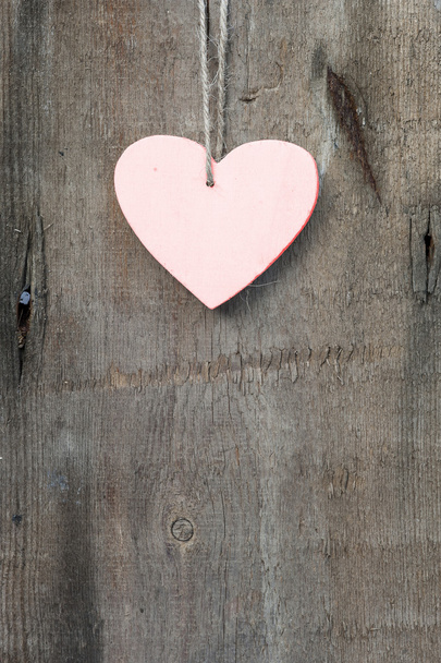 Valentine's Day love heart on rustic style background - Photo, Image
