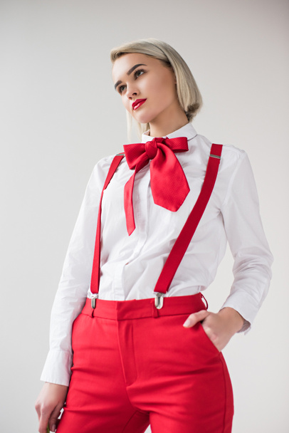fashionable girl in red suspenders and bow - Foto, Imagem