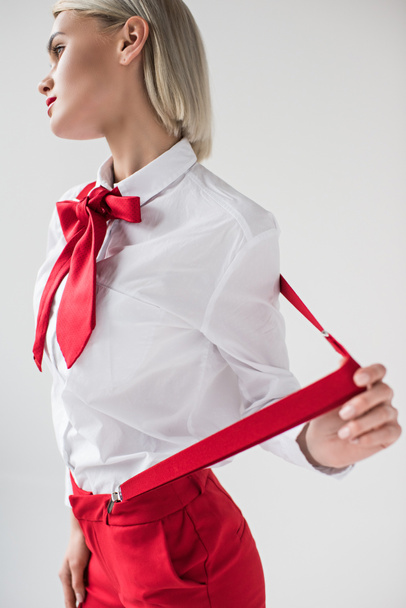 stylish girl in shirt and red suspenders   - Foto, Bild