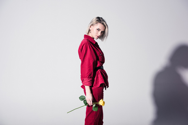 elegant girl in red clothes with rose - Photo, Image