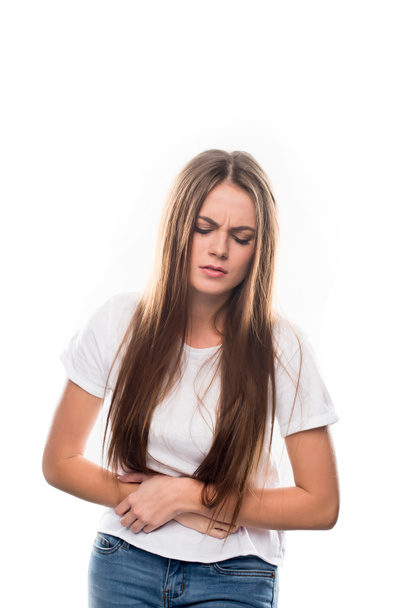 Woman having stomach pain - Foto, immagini