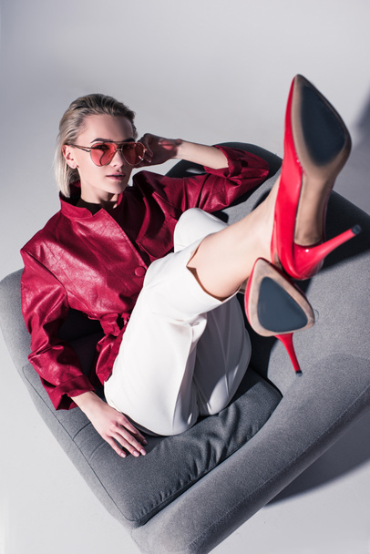 stylish girl in red heels  - Zdjęcie, obraz