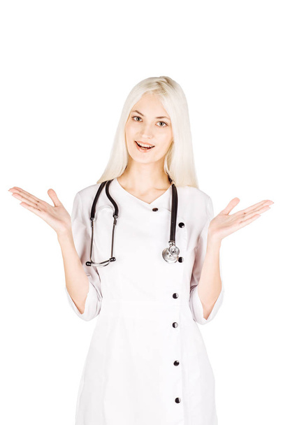 medical doctor woman with open mouth gesturing with hands isolat - Photo, image