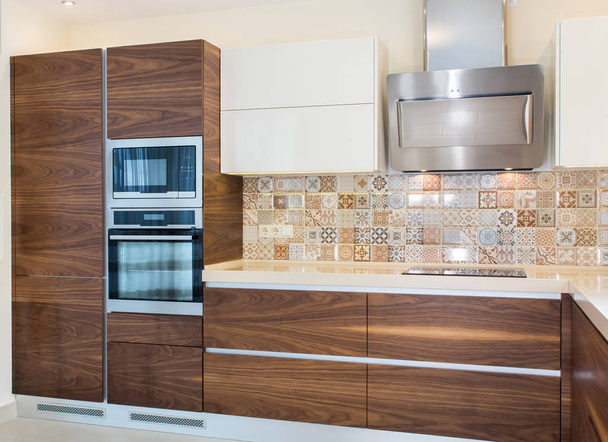 Modern home interior. Modern design of the kitchen in a light, bright interior.  - Фото, зображення
