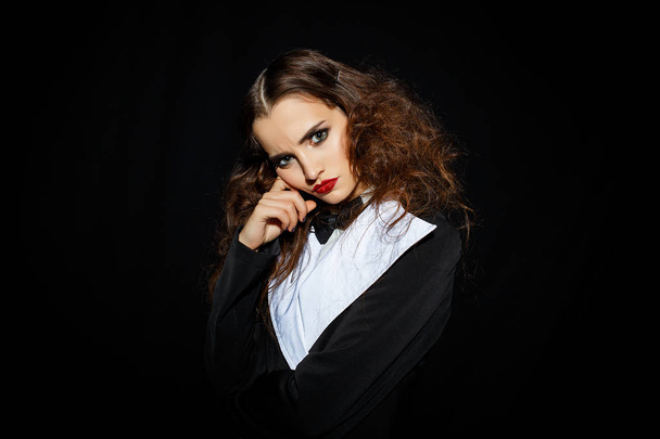 Model in black stylish suit with red lipstick - Foto, immagini