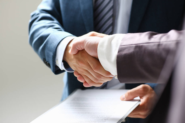 Man in suit shake hand as hello in office - Foto, Bild