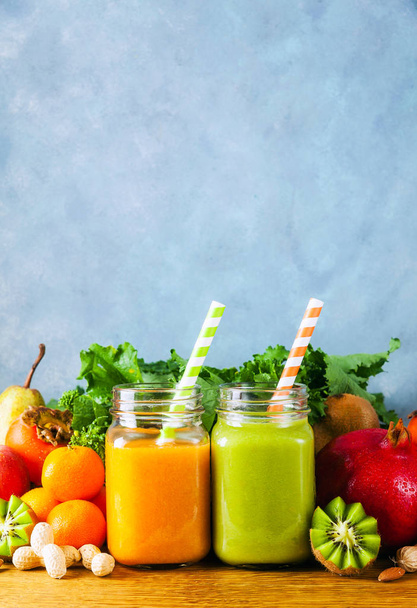 Freshly blended fruit smoothies of various colors and tastes in  - Фото, зображення