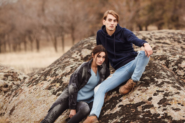 Fashion portrait of young people in trendy casual jeans and jack - Foto, afbeelding