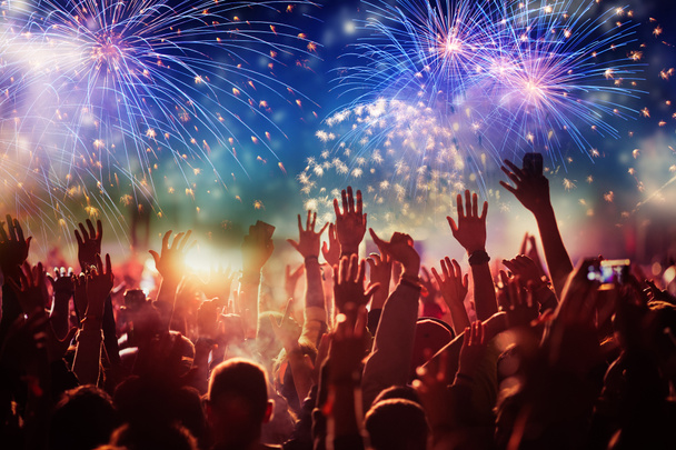 cheering crowd watching fireworks - new year concept - Photo, Image