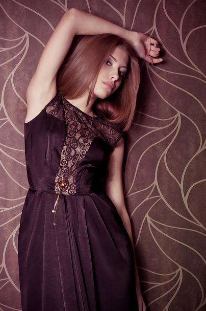 Beautiful young woman in little black dress - Foto, Imagem