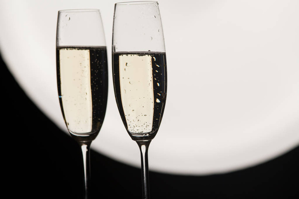 two champagne glasses ready to bring in the New Year - Photo, image
