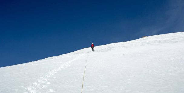 climbers at the mountain summit in scenic Tian Shan range in Kyr - Valokuva, kuva