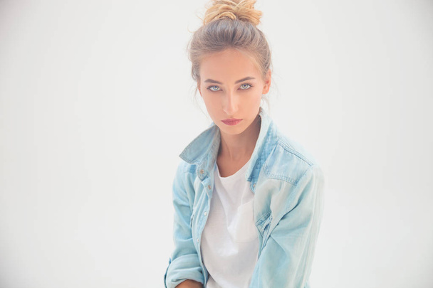 portrait of a blue eyed blonde in jeans shirt - Fotoğraf, Görsel