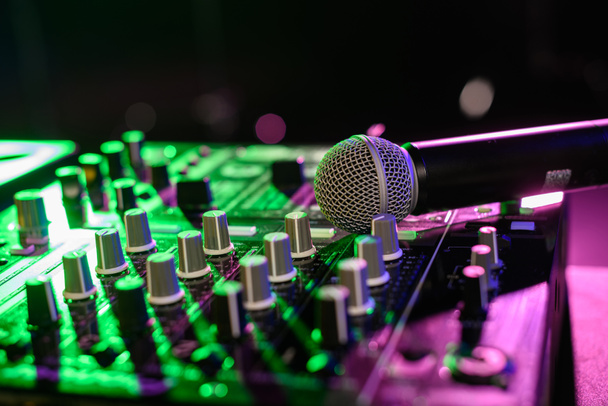 sound mixer with microphone in nightclub - Photo, Image