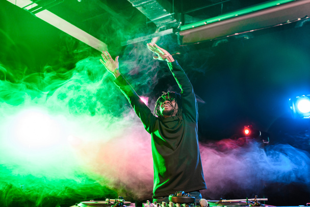 club DJ in nightclub  - Photo, Image