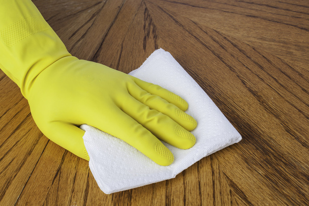 Gloved hand with paper towel - Photo, Image