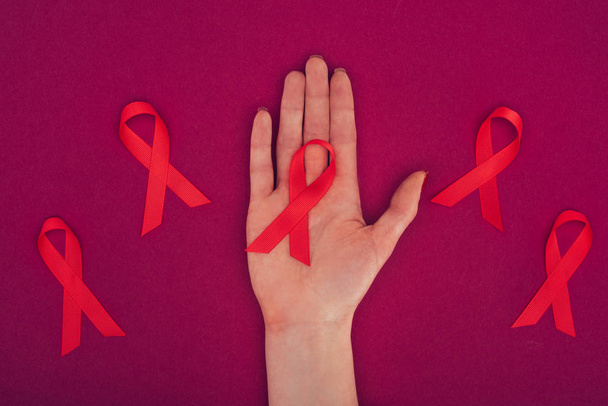 hand with aids ribbons - Photo, Image