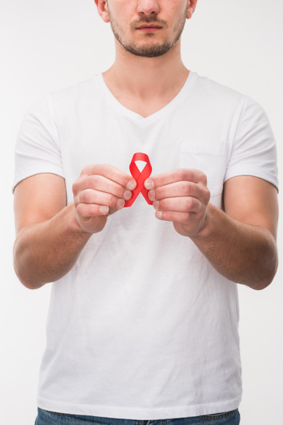 man with red aids ribbon - Фото, изображение