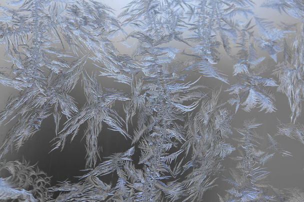 Natuurlijke frosty patronen op het glas - Foto, afbeelding