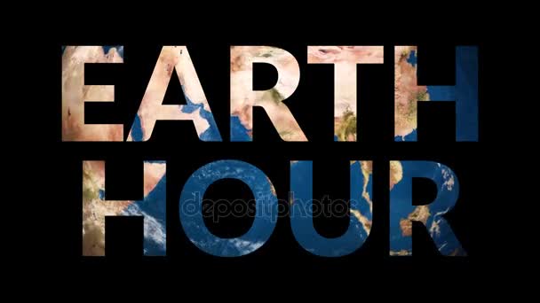 Text Earth Hour odhalující otáčení země světa - Záběry, video