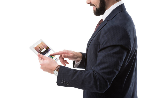 Businessman with tablet with shutterstock website - Foto, Imagen
