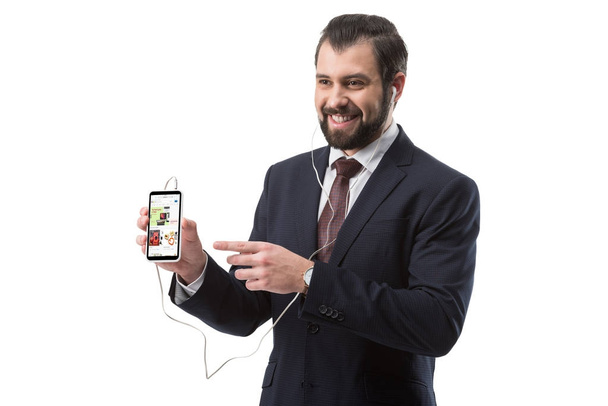 businessman pointing at smartphone - 写真・画像