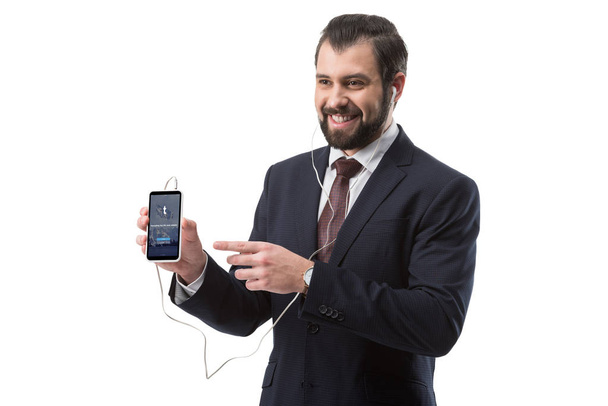 businessman pointing at smartphone - Zdjęcie, obraz