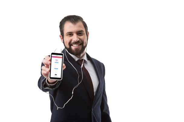businessman showing smartphone with website - Foto, Imagem