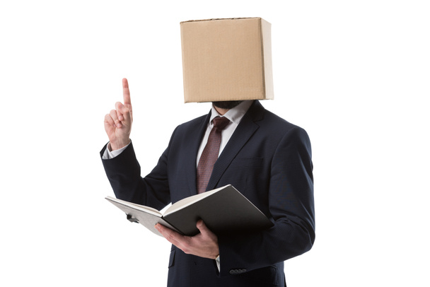 businessman with box on head pointing up - Photo, Image