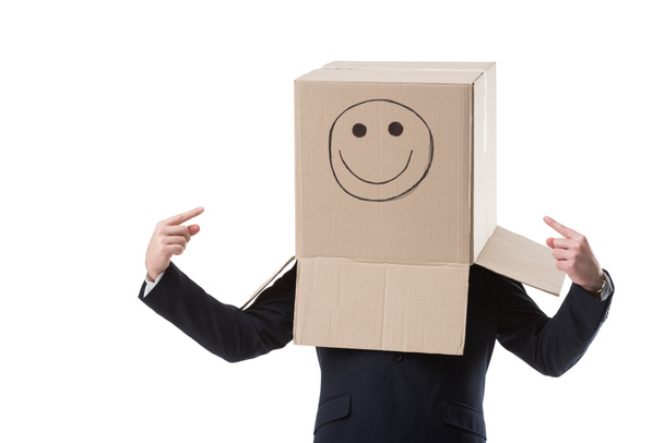 businessman pointing on box on his head - Foto, Bild