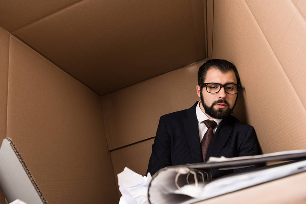exhausted businessman with paperwork - Photo, image