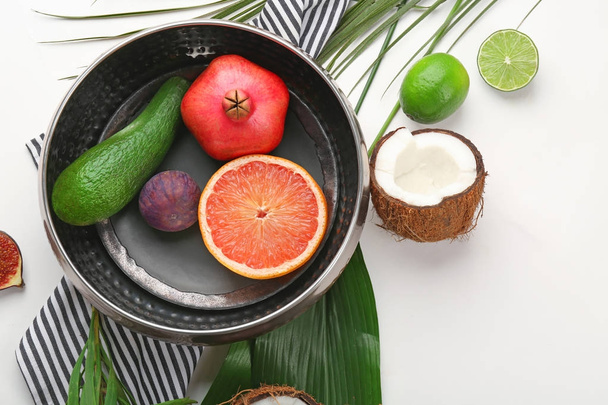 Composition with tropical fruits - Foto, afbeelding