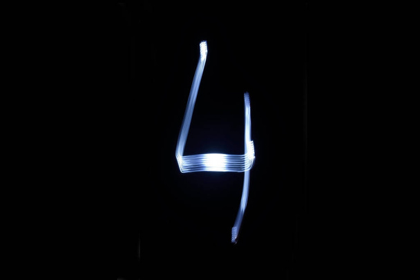 paint with light on black background number 4 - 写真・画像