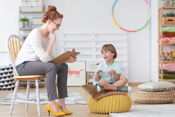 Child counselor during psychotherapy session - Photo, Image