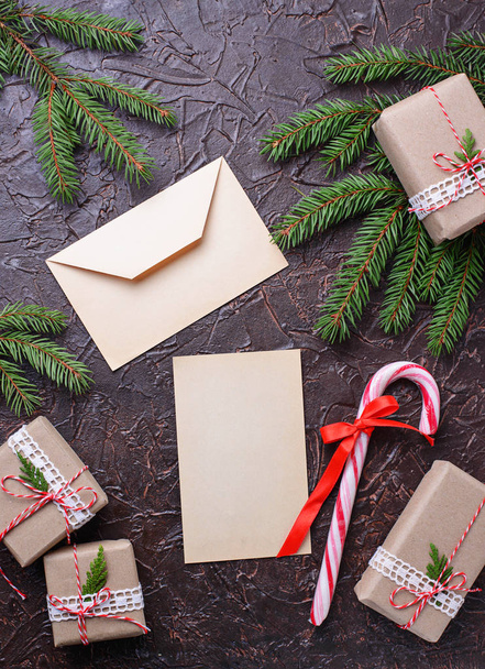 Gift boxes, candy cane and letter. - Foto, afbeelding