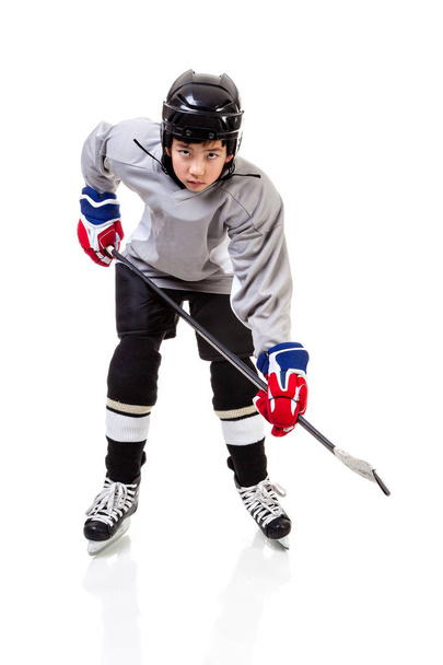 Junior Hokej gracza na białym tle - Zdjęcie, obraz
