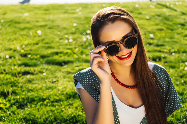 Portrait of Happy Fashion Woman in Sunglasses. Smiling Trendy Girl in Summer.  - Fotó, kép