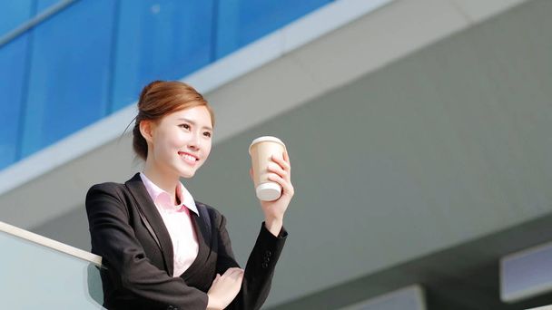  business woman drinking  coffee - Foto, Bild