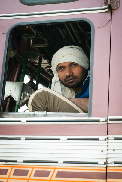 Indian driver in white turban in the cabin of his truck - Zdjęcie, obraz