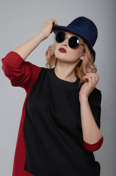 young woman in hat and sunglasses - Photo, image
