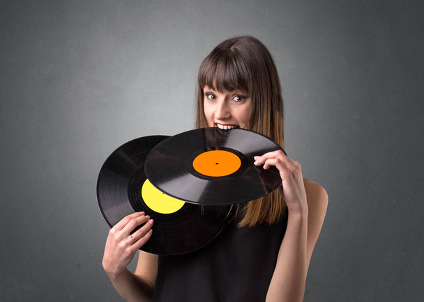 Lady holding vinyl record - Zdjęcie, obraz