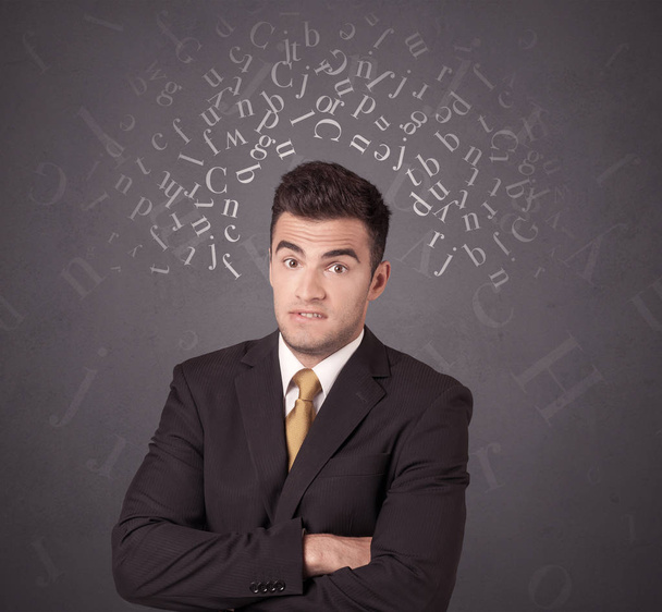 Businessman with alphabet - Φωτογραφία, εικόνα