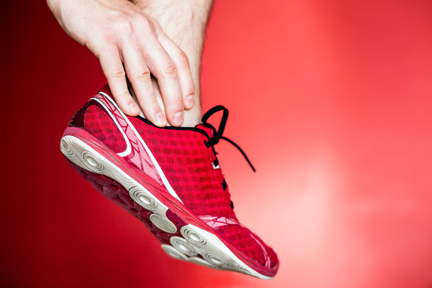 τρέξιμο τραυματισμό, πόδι και τον αστράγαλο πόνος - Φωτογραφία, εικόνα