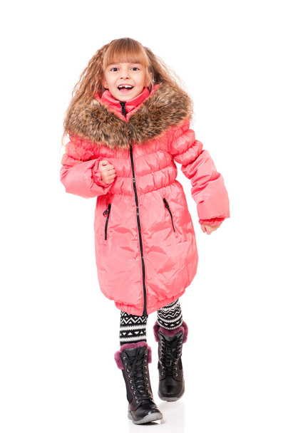 Little girl in winter clothing - Photo, image