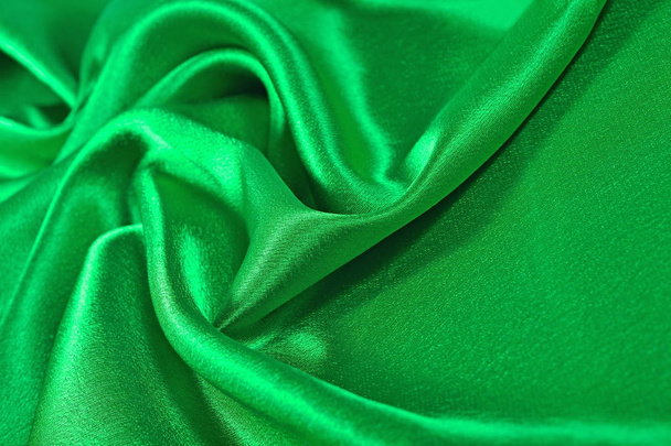 Natuurlijke groene satijn stof textuur achtergrond - Foto, afbeelding