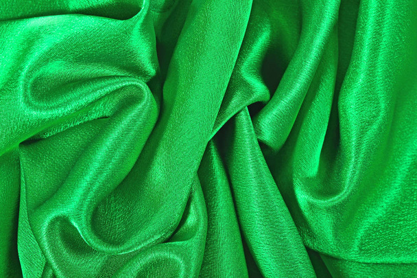 Фон из натуральной зеленой атласной ткани
 - Фото, изображение