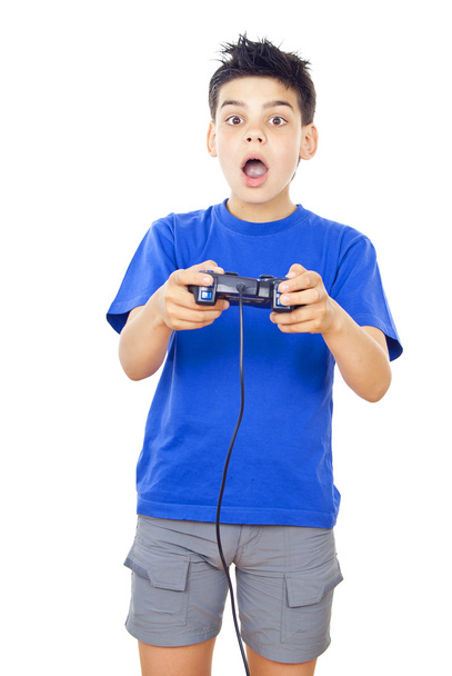 child plays video games on the joystick - Foto, afbeelding
