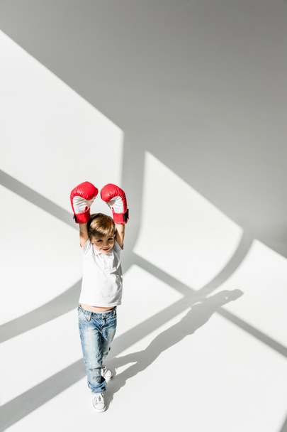 child in boxing gloves - Фото, изображение