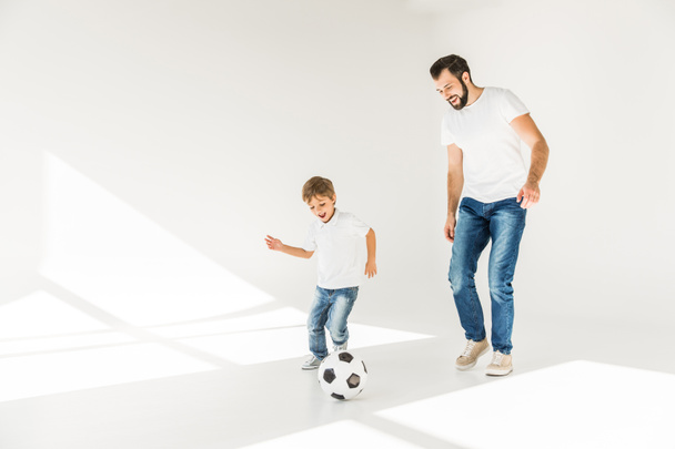 father and son with soccer ball - Valokuva, kuva