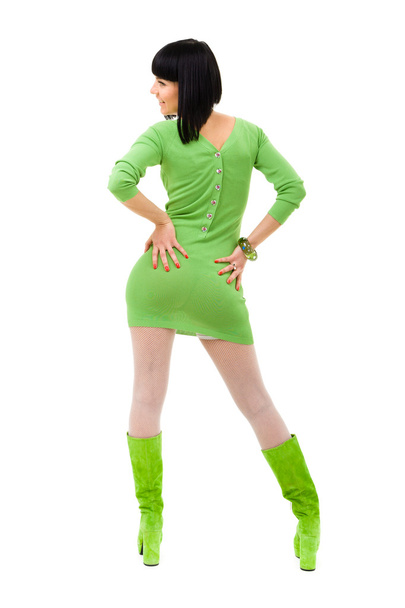 smiling woman wearing a green dress and green shoes on a isolate - Photo, image